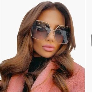 Gucci oversized sunglasses.